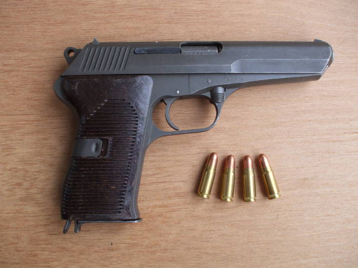 CZ-52 or ČZ vzor 52 pistol
					with 7.62x25mm ammunition.