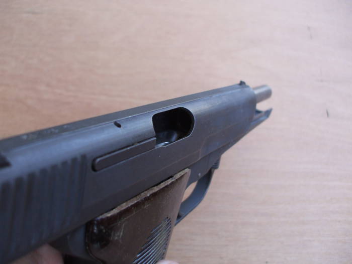 Lock the CZ-52 slide back and verify that the chamber is empty and the weapon is unloaded.
