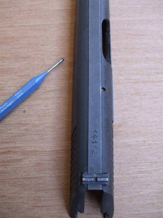 Slide prepared to drift out extractor pin.