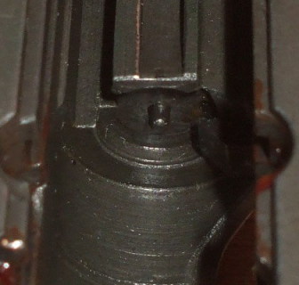Incorrectly assembled firing pin and slide.  This is an extremely dangerous condition, the weapon will uncontrollably fire.