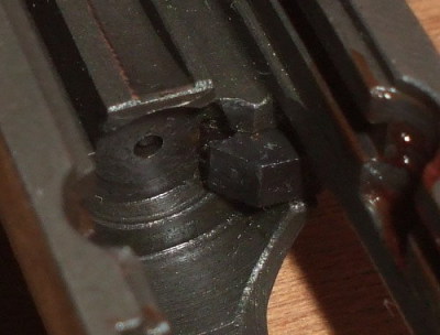 Correctly assembled firing pin and slide.  The tip of the firing pin is well below the surface of the bolt face.